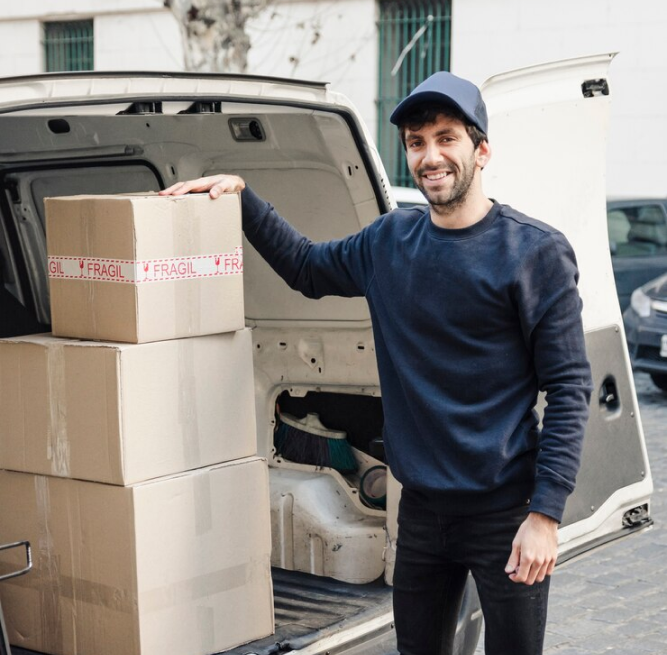 Professional mover driving a truck, representing top moving companies in Jupiter, Florida like Sergeant Moving & Storage